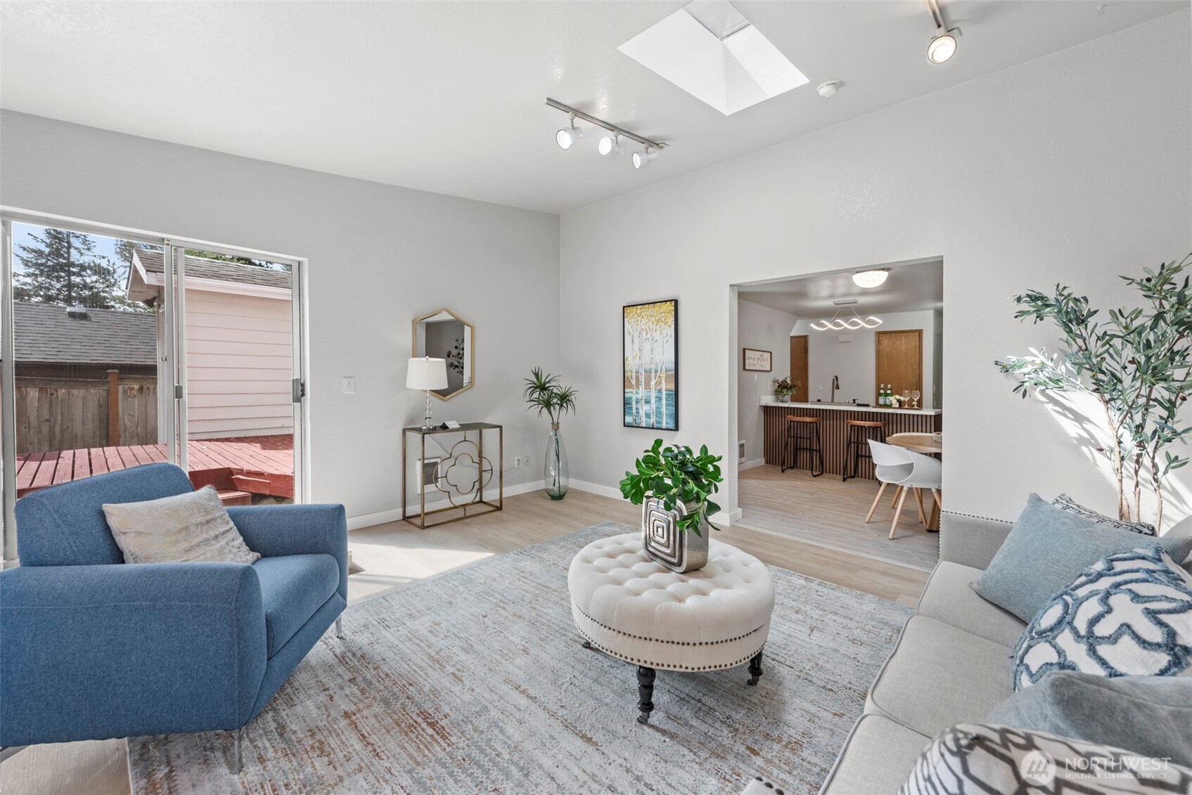 4302 155th Street Southwest Lynnwood, WA 98087 - Photo 5 of 19 a living room with furniture and a potted plant