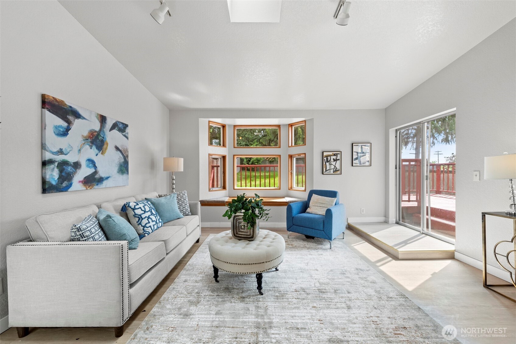 4302 155th Street Southwest Lynnwood, WA 98087 - Photo 7 of 19 a living room with furniture and a large window