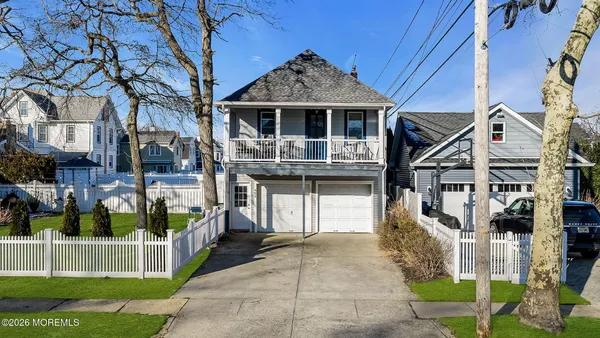 a front view of a house with a porch