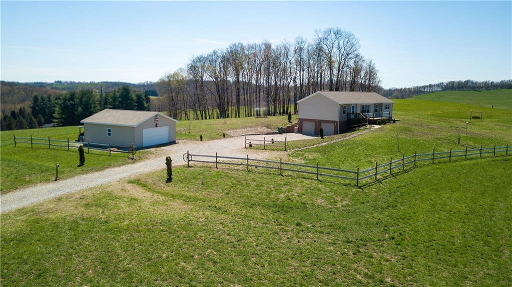 195 Elm Road Avella, PA 15312 - Photo 1 of 25 A LITTLE PIECE OF HEAVEN! That's what you will say when you move into this gorgeous property. Notice the layout of the property; the owner has planned it to maximize the views.