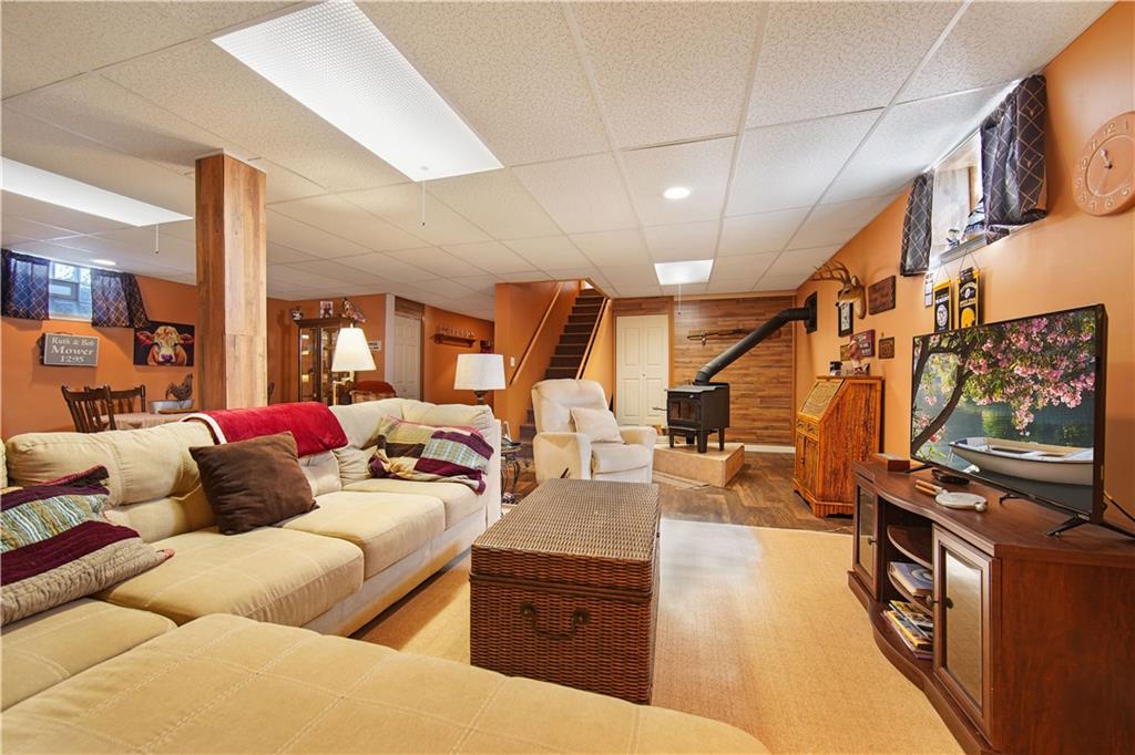 195 Elm Road Avella, PA 15312 - Photo 20 of 25 The gathering area of the GAMEROOM is spacious and comfortable. Measuring 30x22 there is plenty of lighting; the strong congoleum flooring is accentuated with area rugs.