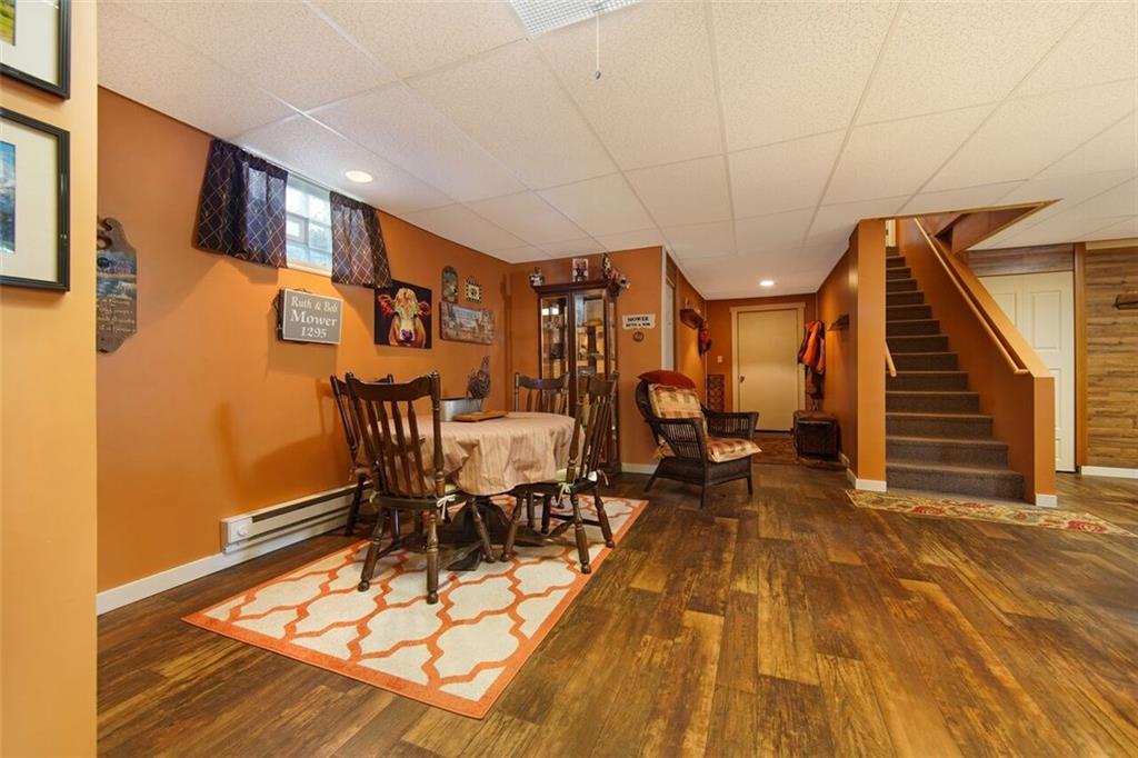 195 Elm Road Avella, PA 15312 - Photo 22 of 25 Another view of the dining area in the downstairs GAMEROOM. The wide stairway takes you to the main floor.