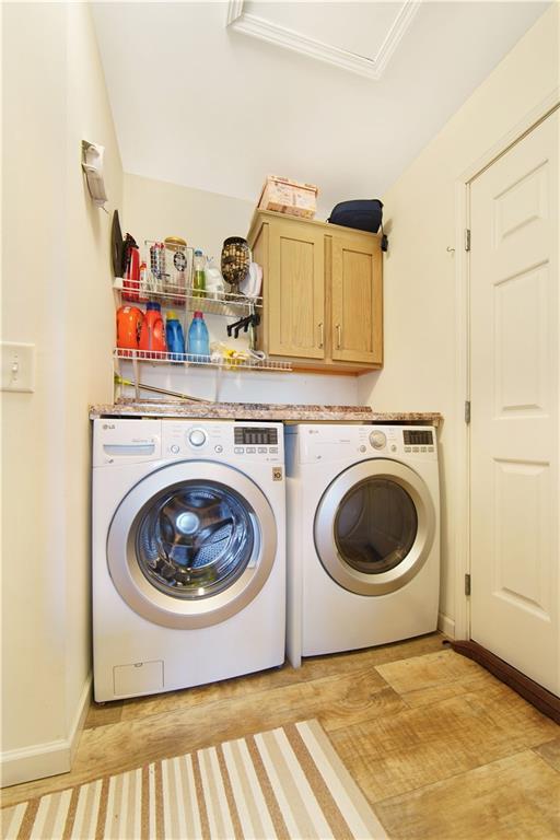 195 Elm Road Avella, PA 15312 - Photo 24 of 25 The laundry area is conveniently located off the kitchen. Measuring 13x7 it features laminate countertops and overhead cabinets. The LG washer and dryer are included. It makes wash day a little less stressful; everything is at your fingertips.