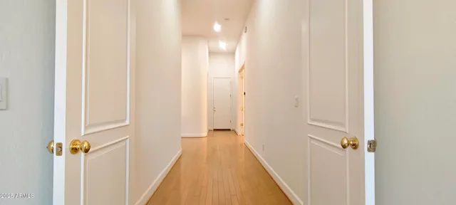 a kitchen with stainless steel appliances granite countertop a sink a stove and a microwave