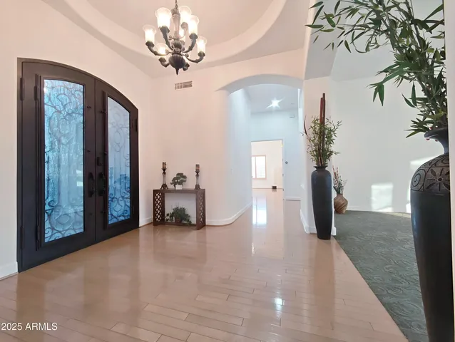 a kitchen with stainless steel appliances a sink stove and refrigerator