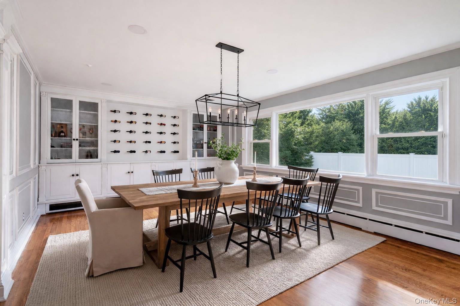 148 Exeter Road Massapequa, NY 11758 - Photo 12 of 28 a view of a dining room with furniture window and outside view