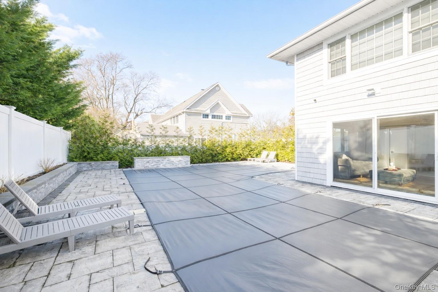 148 Exeter Road Massapequa, NY 11758 - Photo 28 of 28 a view of a pathway both side of house