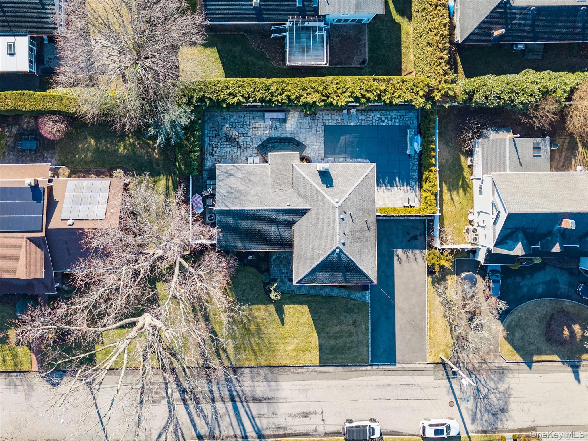 148 Exeter Road Massapequa, NY 11758 - Photo 8 of 28 an aerial view of residential houses with outdoor space