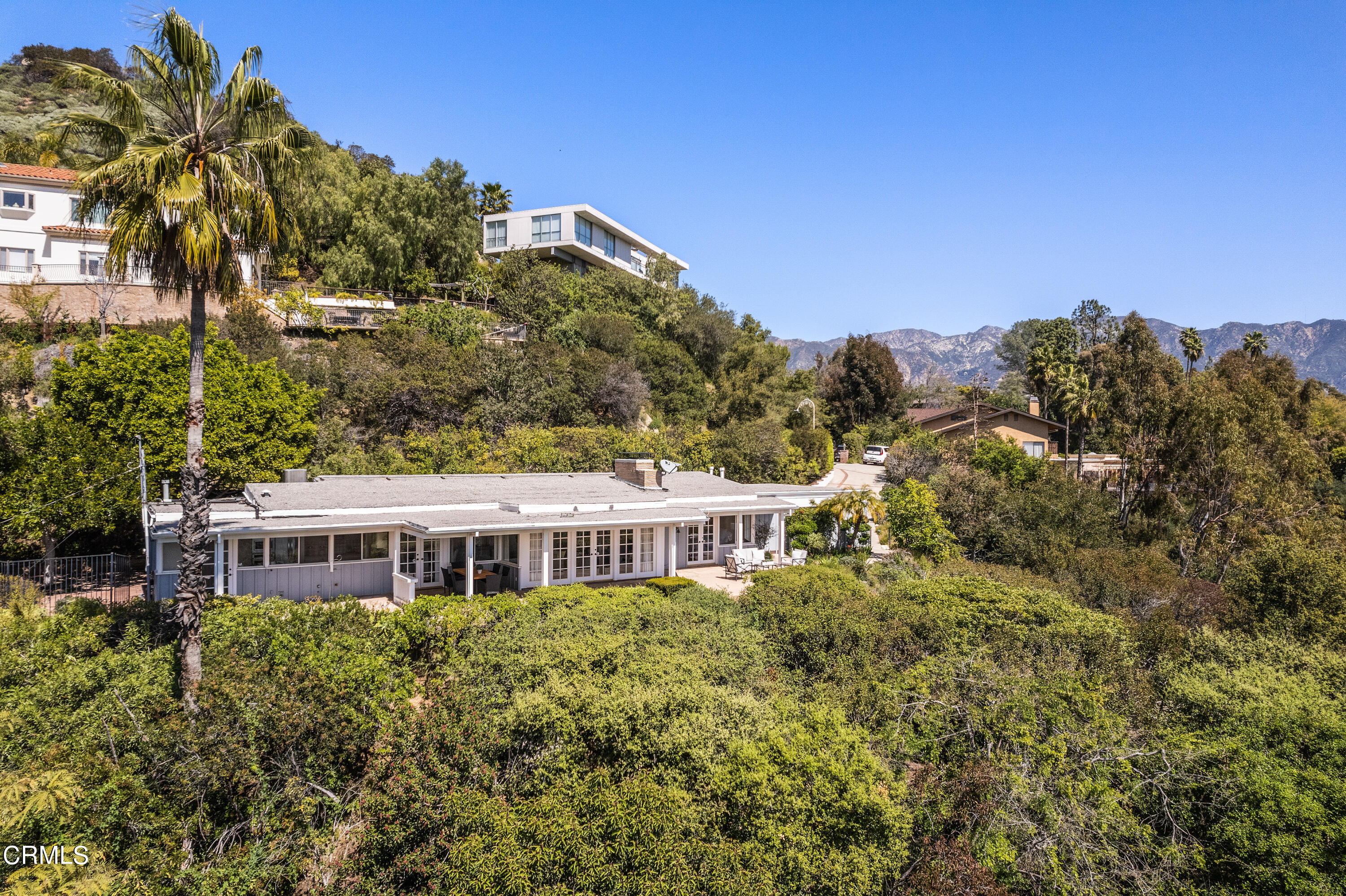 1444 Normandy Drive Pasadena, CA 91103 - Photo 1 of 25 a front view of a house with a garden