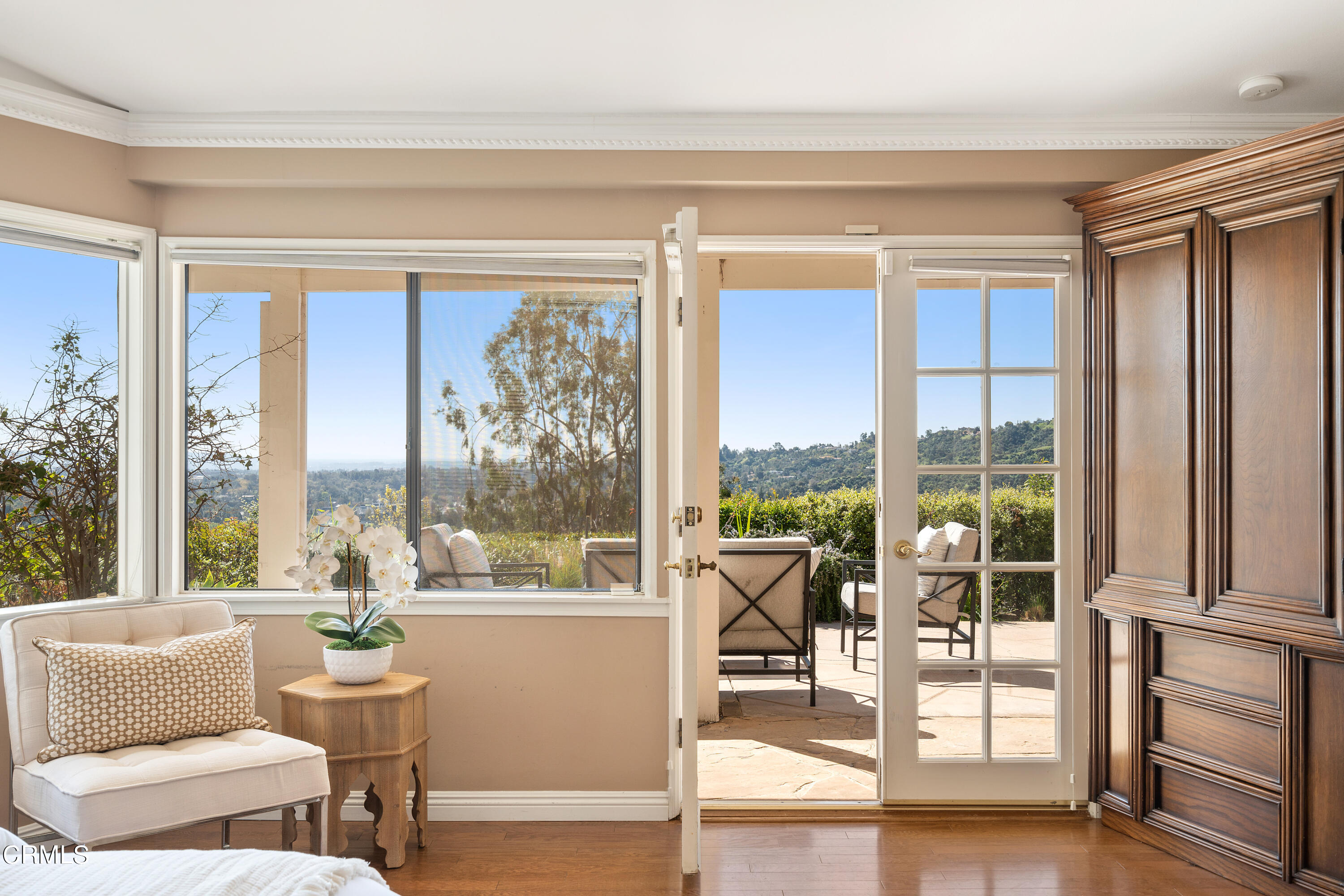 1444 Normandy Drive Pasadena, CA 91103 - Photo 11 of 25 a living room with furniture and floor to ceiling windows