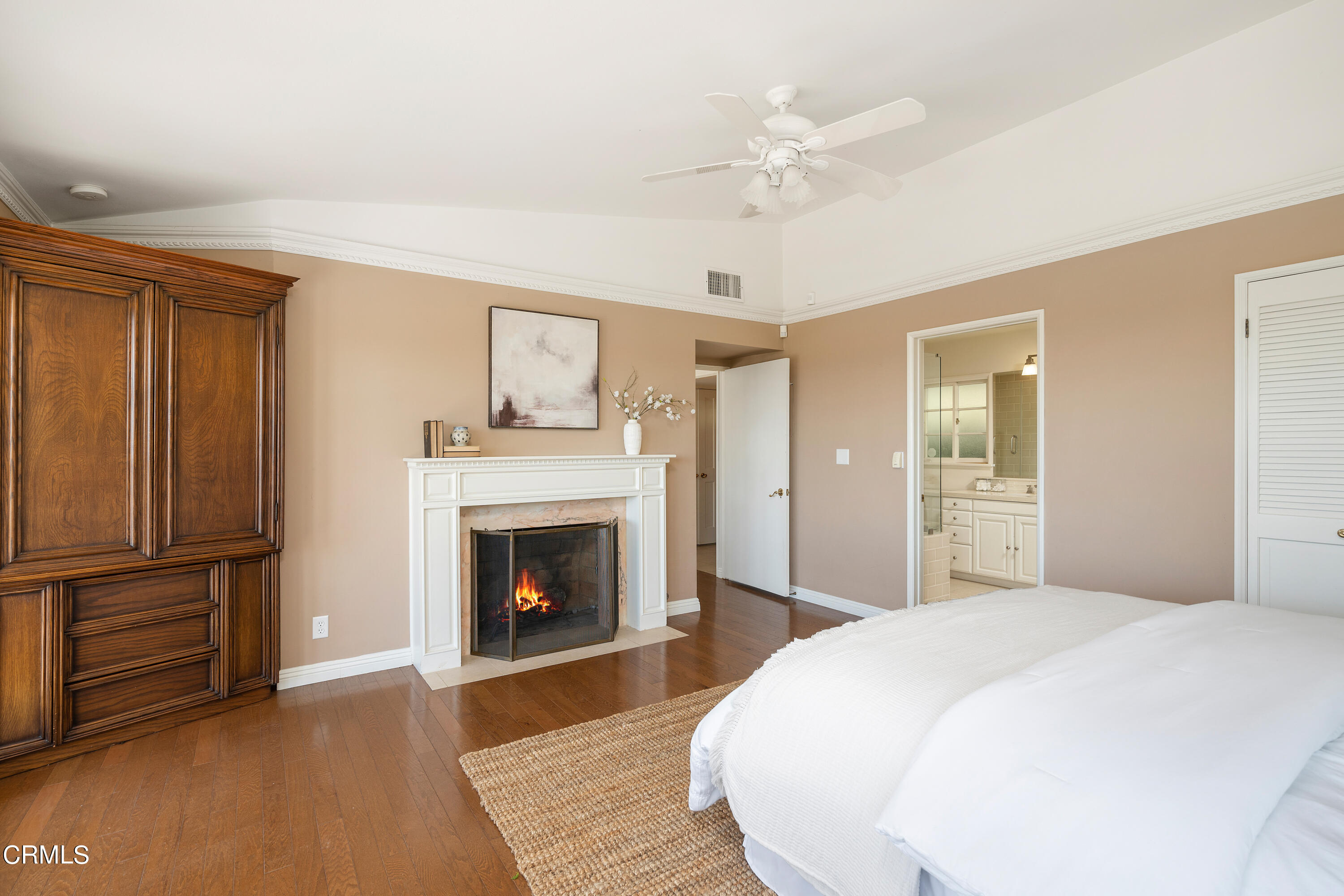 1444 Normandy Drive Pasadena, CA 91103 - Photo 12 of 25 a bedroom with a bed and a fireplace