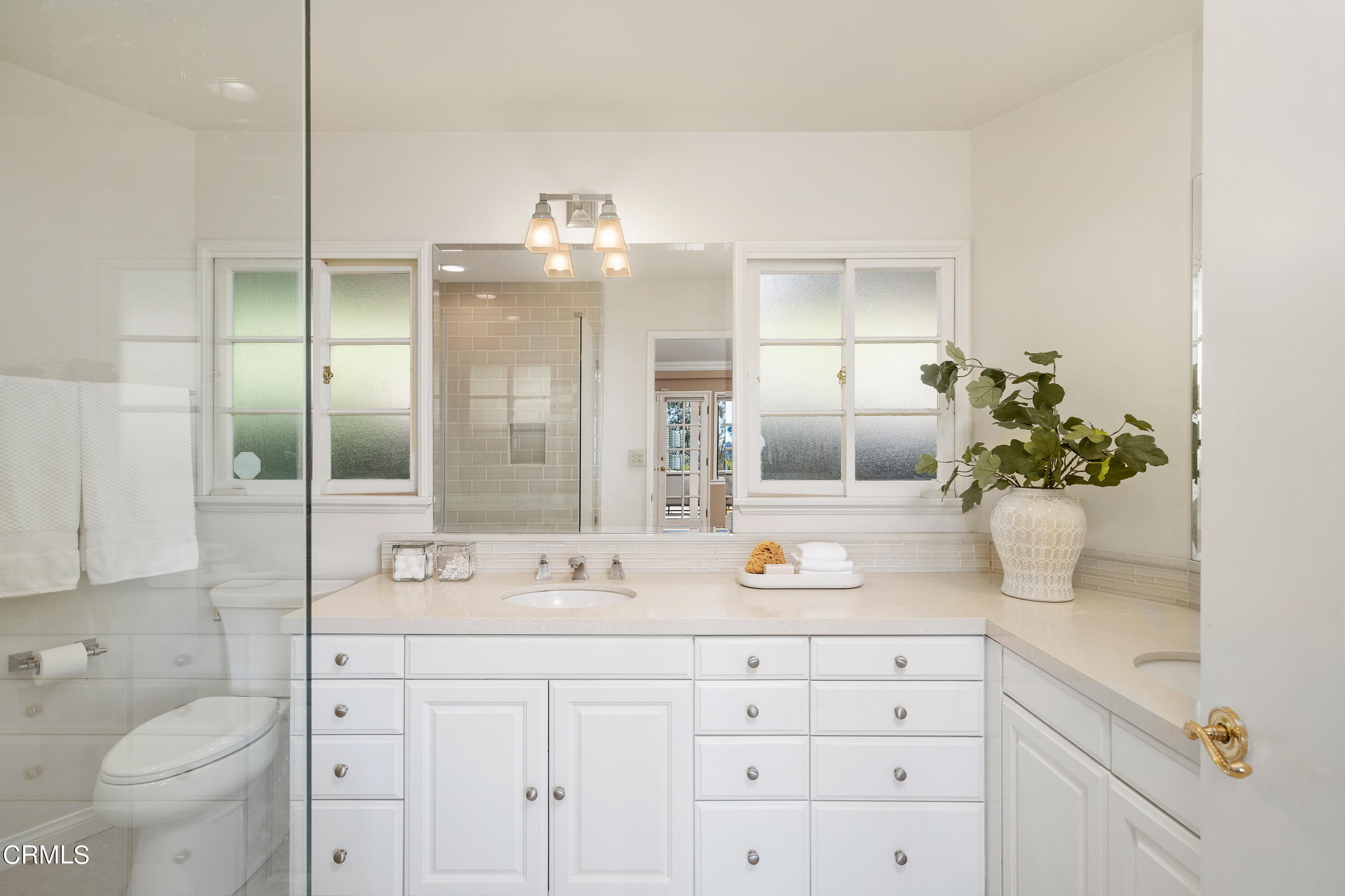 1444 Normandy Drive Pasadena, CA 91103 - Photo 14 of 25 a bathroom with a sink a vanity and a mirror