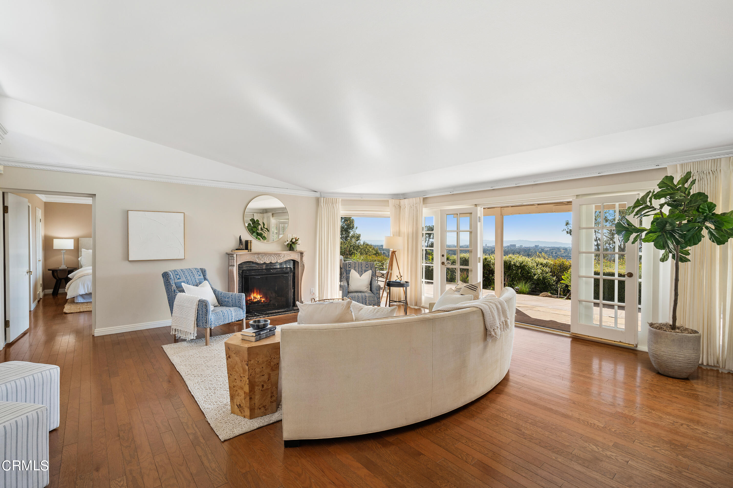 1444 Normandy Drive Pasadena, CA 91103 - Photo 3 of 25 a living room with fireplace furniture and a wooden floor