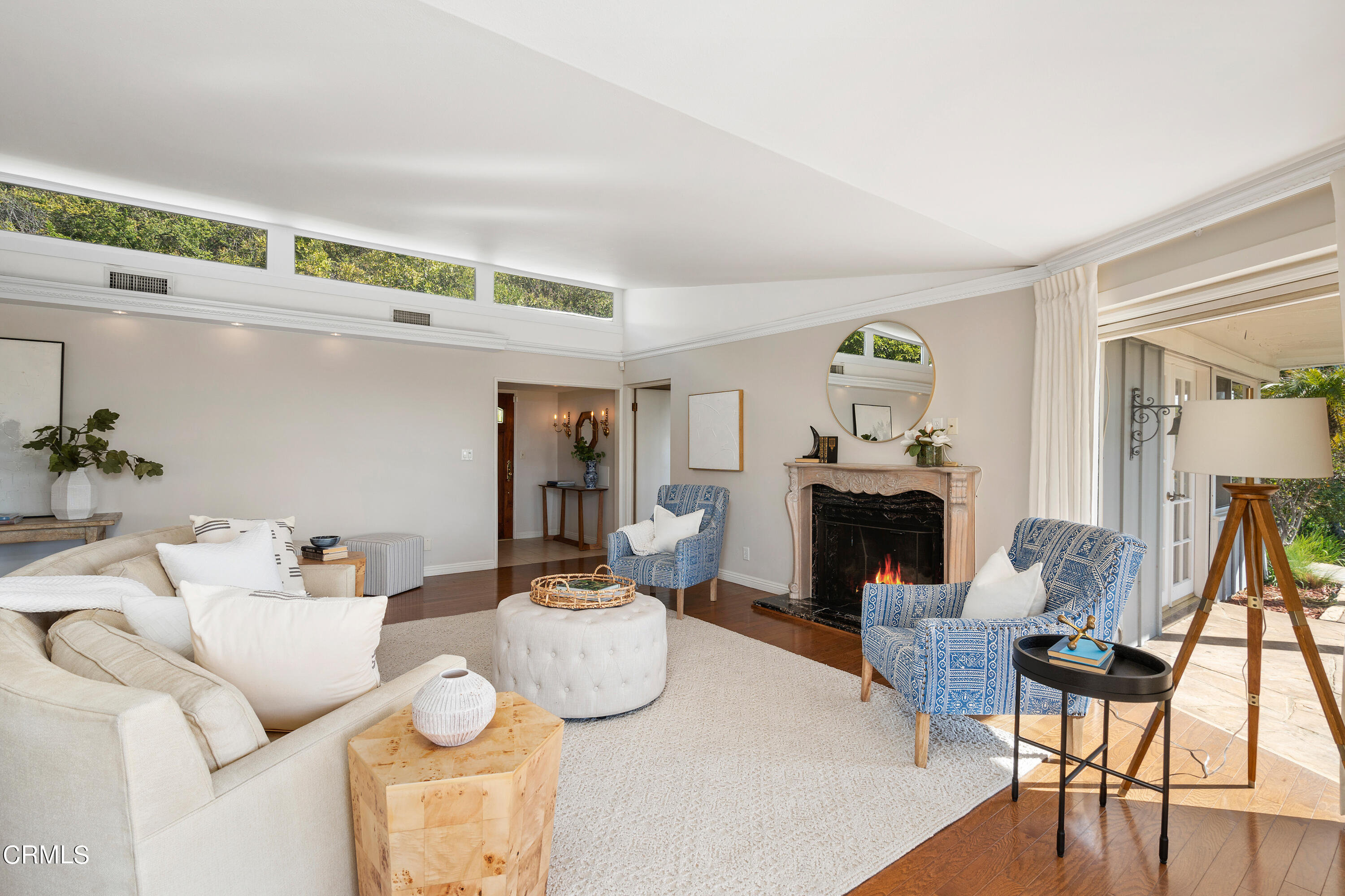 1444 Normandy Drive Pasadena, CA 91103 - Photo 5 of 25 a living room with furniture a fireplace and a table
