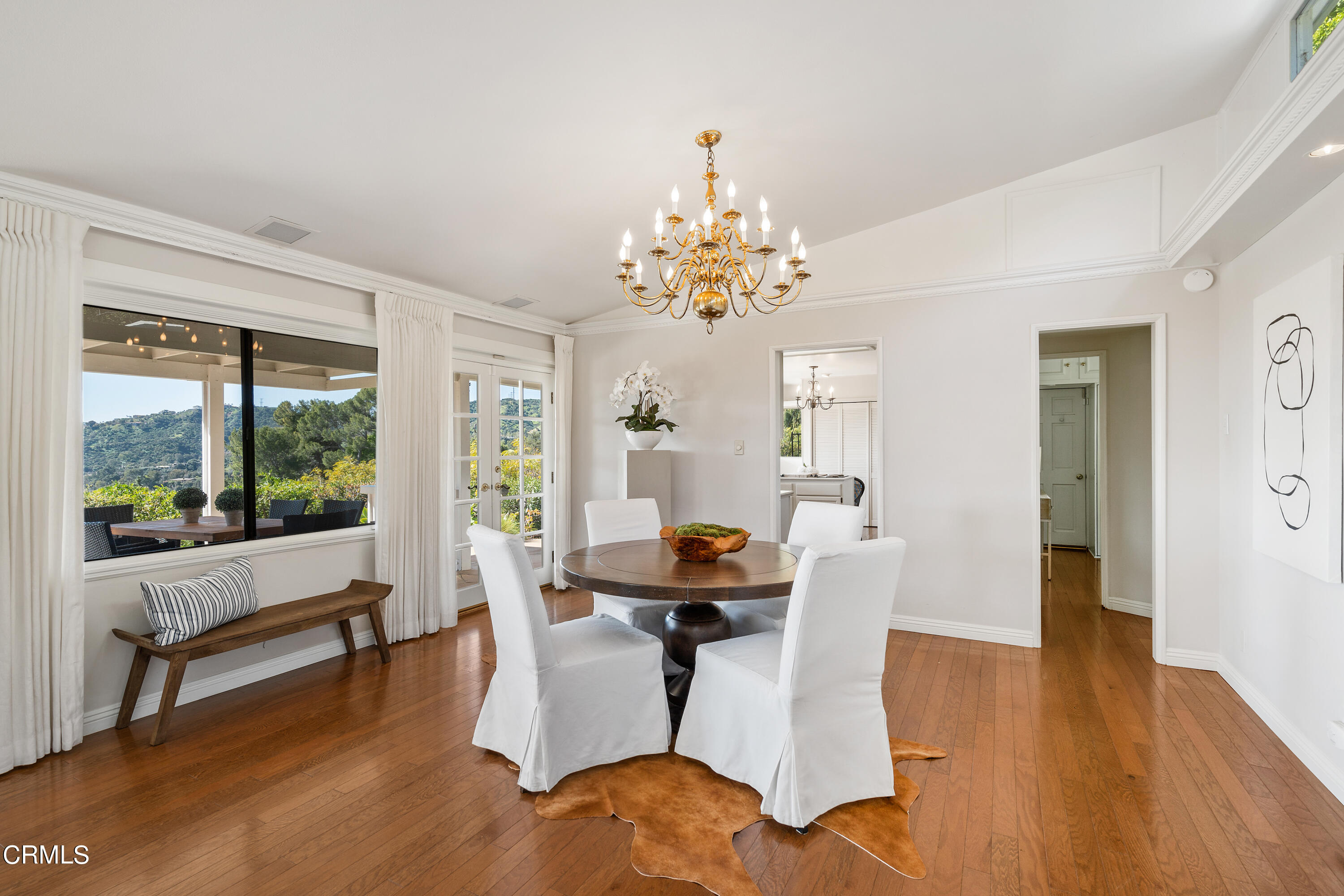 1444 Normandy Drive Pasadena, CA 91103 - Photo 6 of 25 a dining room with wooden floor and large windows