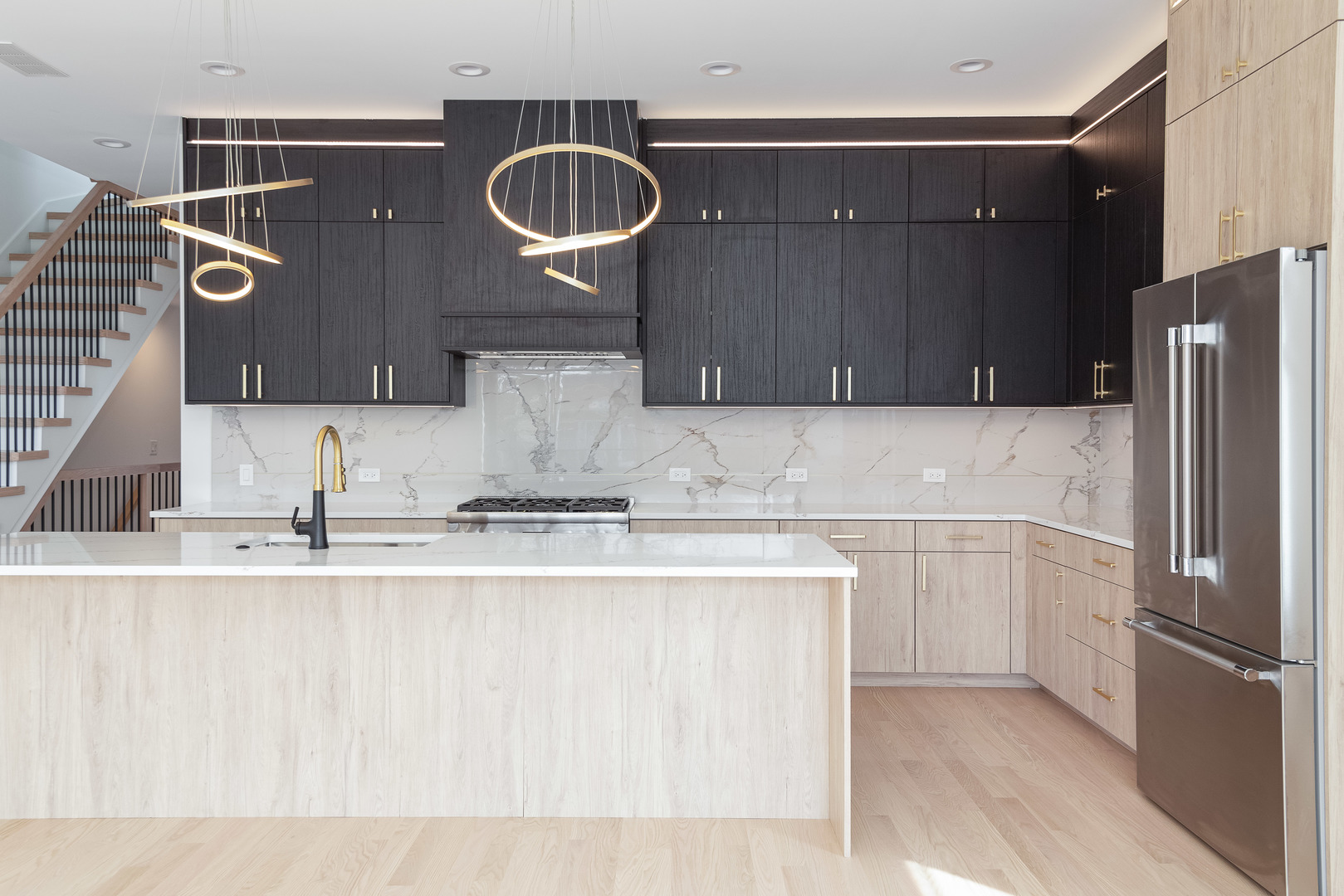 1334 West Rosedale Avenue, Unit 3 Chicago, IL 60660 - Photo 4 of 24 a kitchen with stainless steel appliances granite countertop a sink and a refrigerator