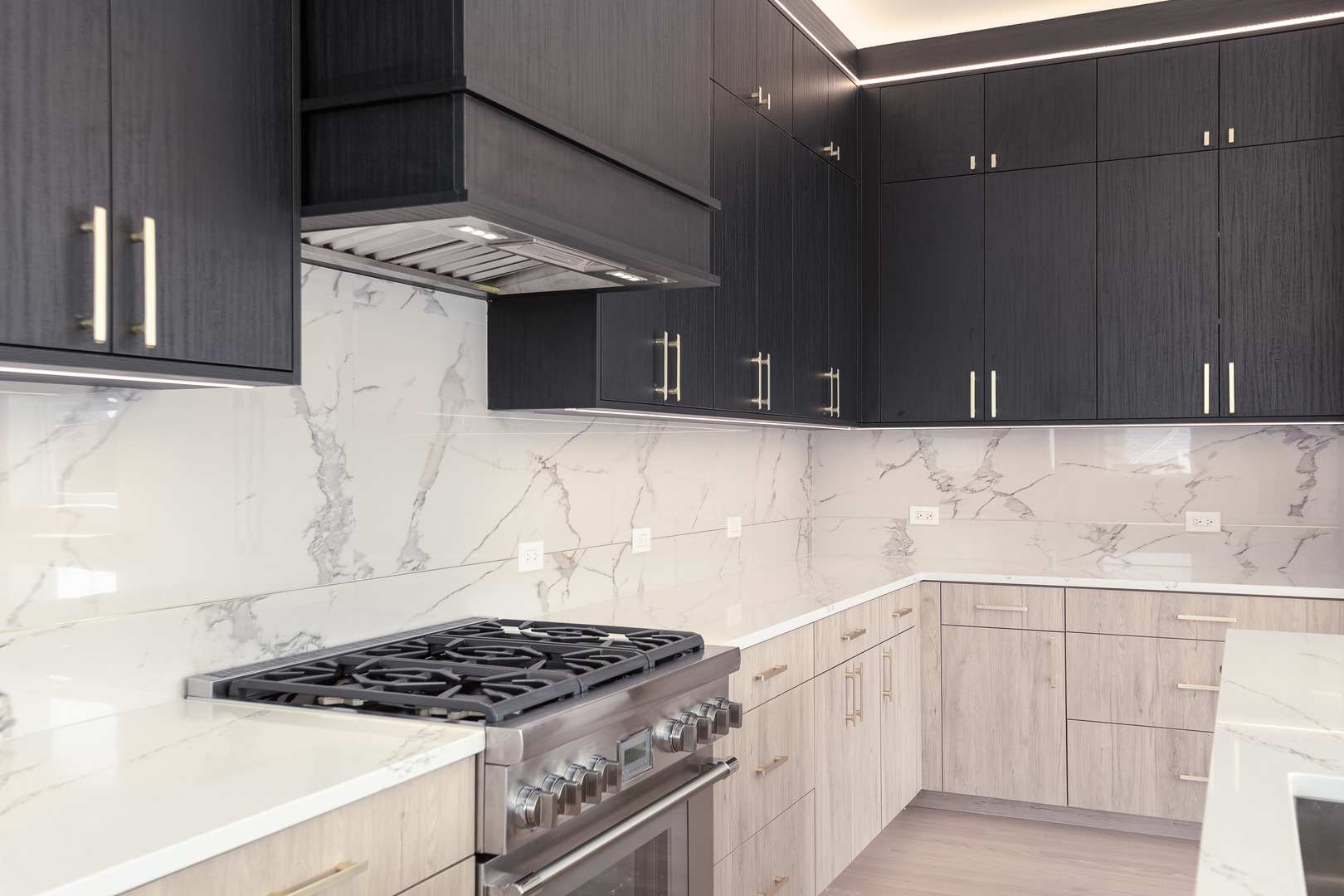 1334 West Rosedale Avenue, Unit 3 Chicago, IL 60660 - Photo 5 of 24 a kitchen with granite countertop a stove and a sink