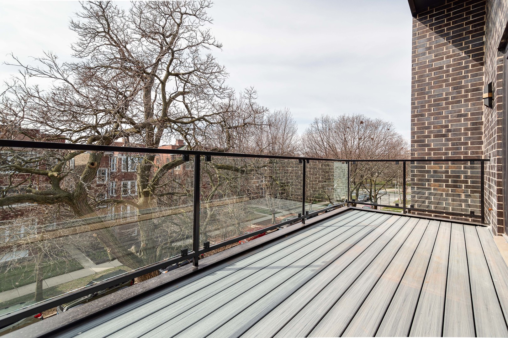 1334 West Rosedale Avenue, Unit 3 Chicago, IL 60660 - Photo 10 of 24 a view of balcony with wooden floor