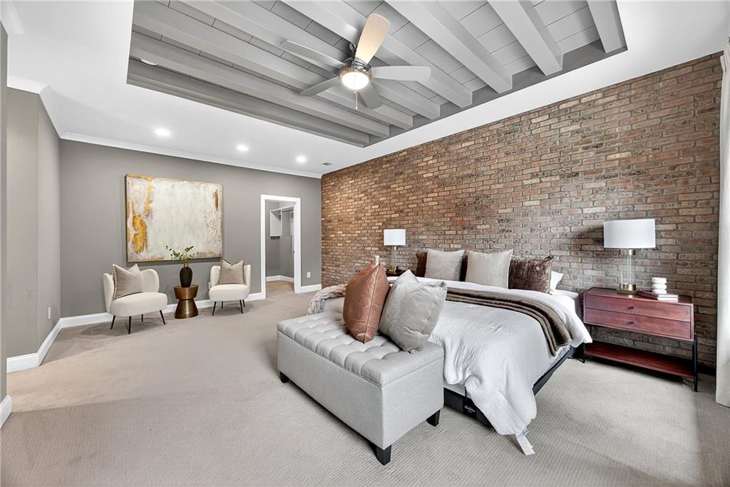 2675 Sugar Mill Drive Southeast Atlanta, GA 30316 - Photo 14 of 38 a bedroom with furniture and a large window