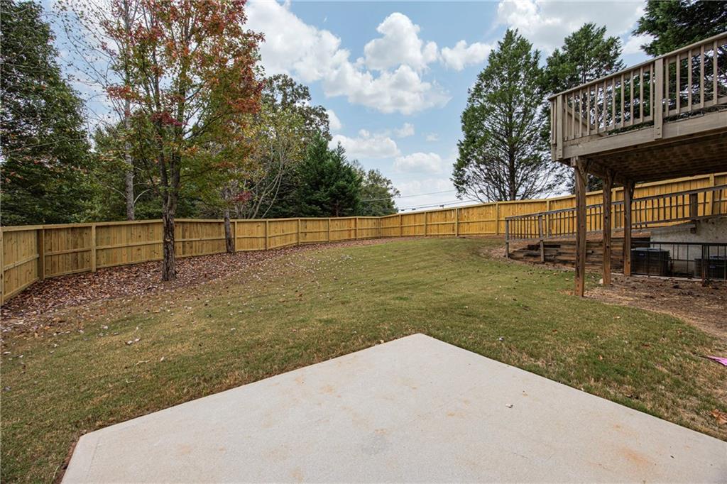 2675 Sugar Mill Drive Southeast Atlanta, GA 30316 - Photo 31 of 38 a view of a lake with a yard