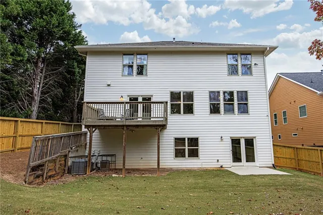 a house with river in front of it