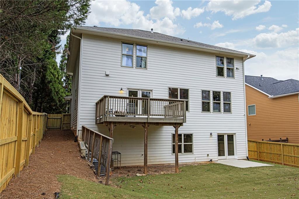 2675 Sugar Mill Drive Southeast Atlanta, GA 30316 - Photo 34 of 38 a front view of a house with balcony