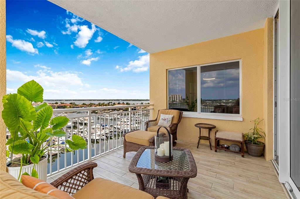 606 Riviera Dunes Way, Unit 601 Palmetto, FL 34221 - Photo 11 of 70 a view of a balcony with chairs