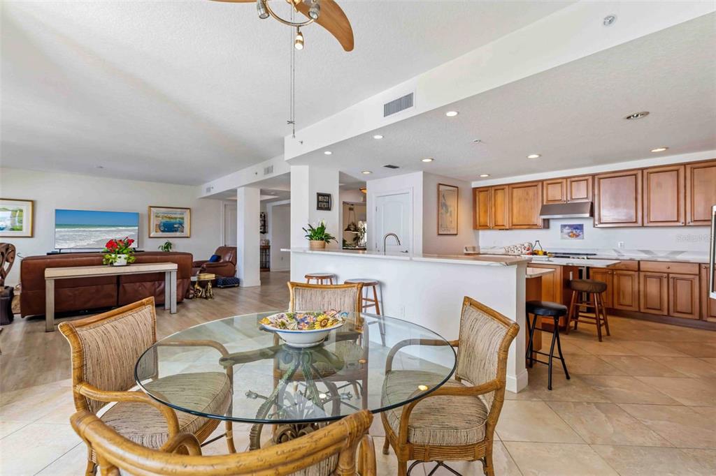 606 Riviera Dunes Way, Unit 601 Palmetto, FL 34221 - Photo 14 of 70 a view of a dining room with furniture