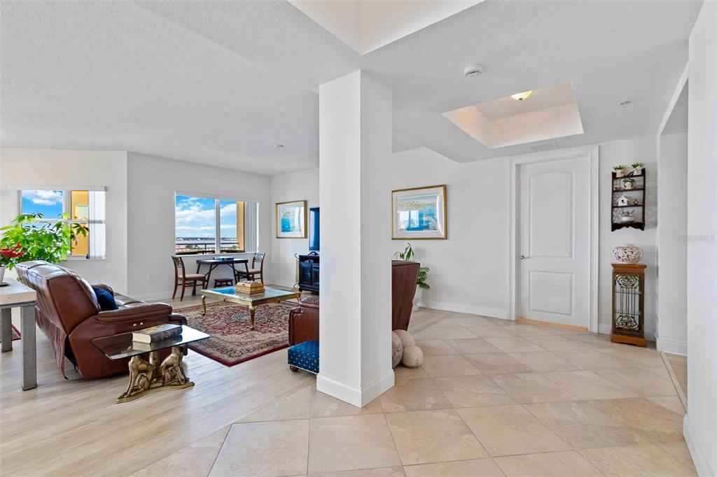 606 Riviera Dunes Way, Unit 601 Palmetto, FL 34221 - Photo 29 of 70 a living room with furniture and a window