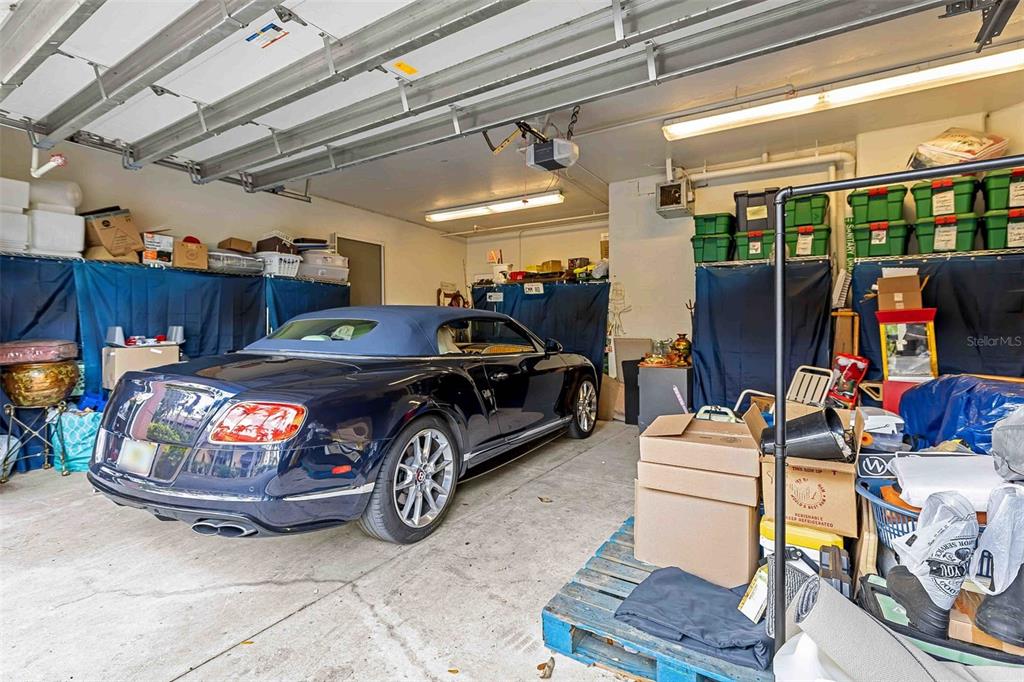 606 Riviera Dunes Way, Unit 601 Palmetto, FL 34221 - Photo 49 of 70 a car parked in a garage
