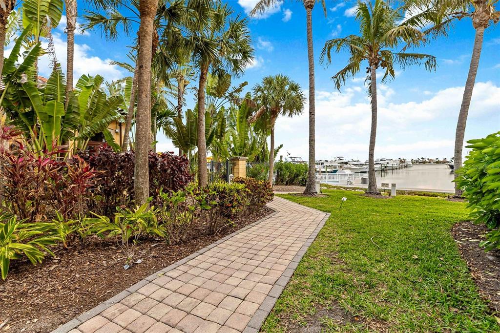 606 Riviera Dunes Way, Unit 601 Palmetto, FL 34221 - Photo 50 of 70 a view of a yard with palm trees