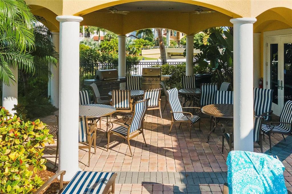 606 Riviera Dunes Way, Unit 601 Palmetto, FL 34221 - Photo 64 of 70 a garden view with a seating space