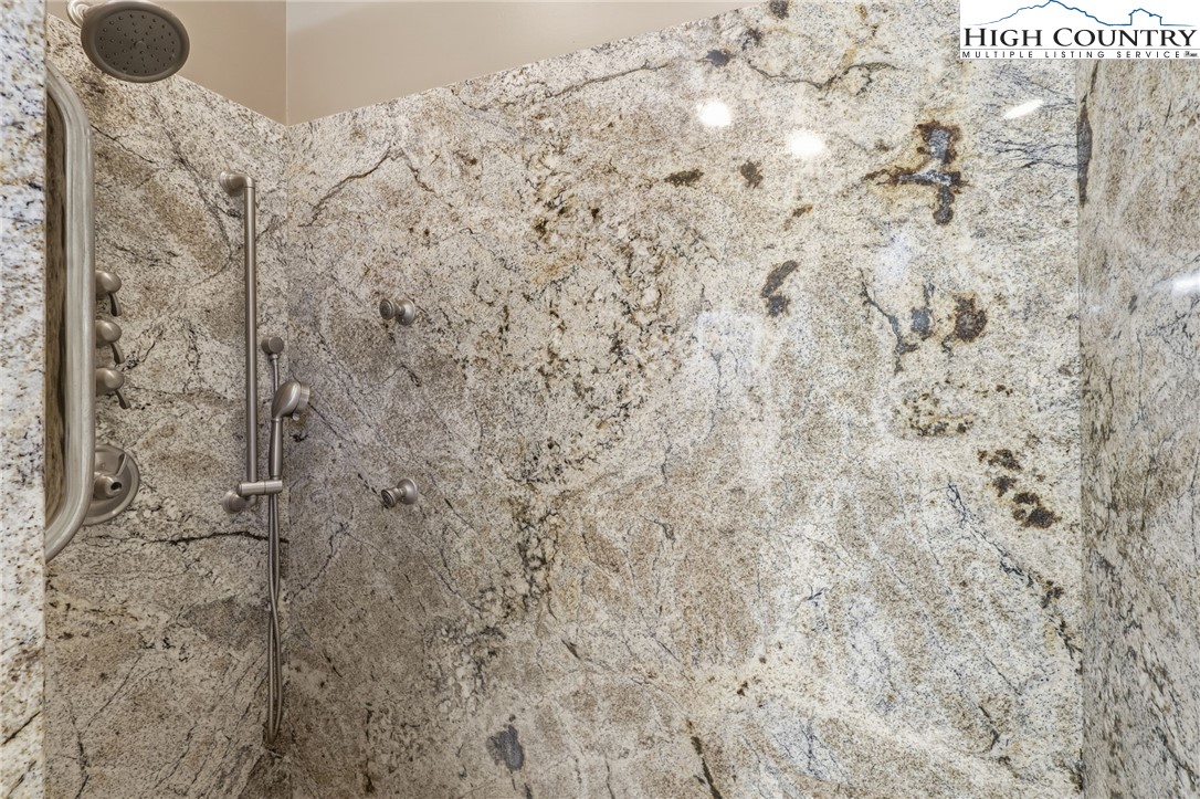 112 North Pinnacle Ridge Road Beech Mountain, NC 28604 - Photo 16 of 40 a bathroom with a shower