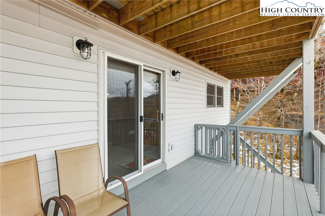 112 North Pinnacle Ridge Road Beech Mountain, NC 28604 - Photo 34 of 40 a view of a balcony with furniture