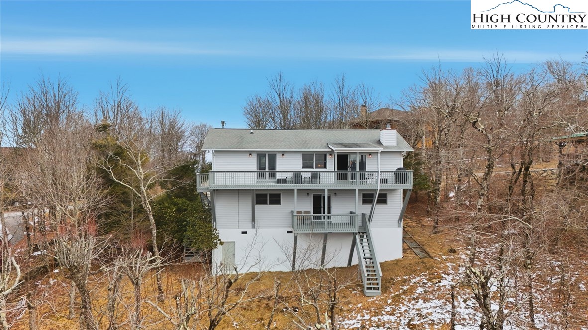 112 North Pinnacle Ridge Road Beech Mountain, NC 28604 - Photo 38 of 40 a view of a house with a yard
