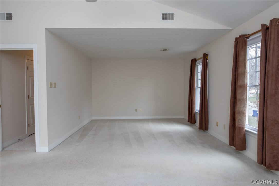 4624 Laurel Spring Court Chester, VA 23831 - Photo 18 of 31 an empty room with a window and a hallway
