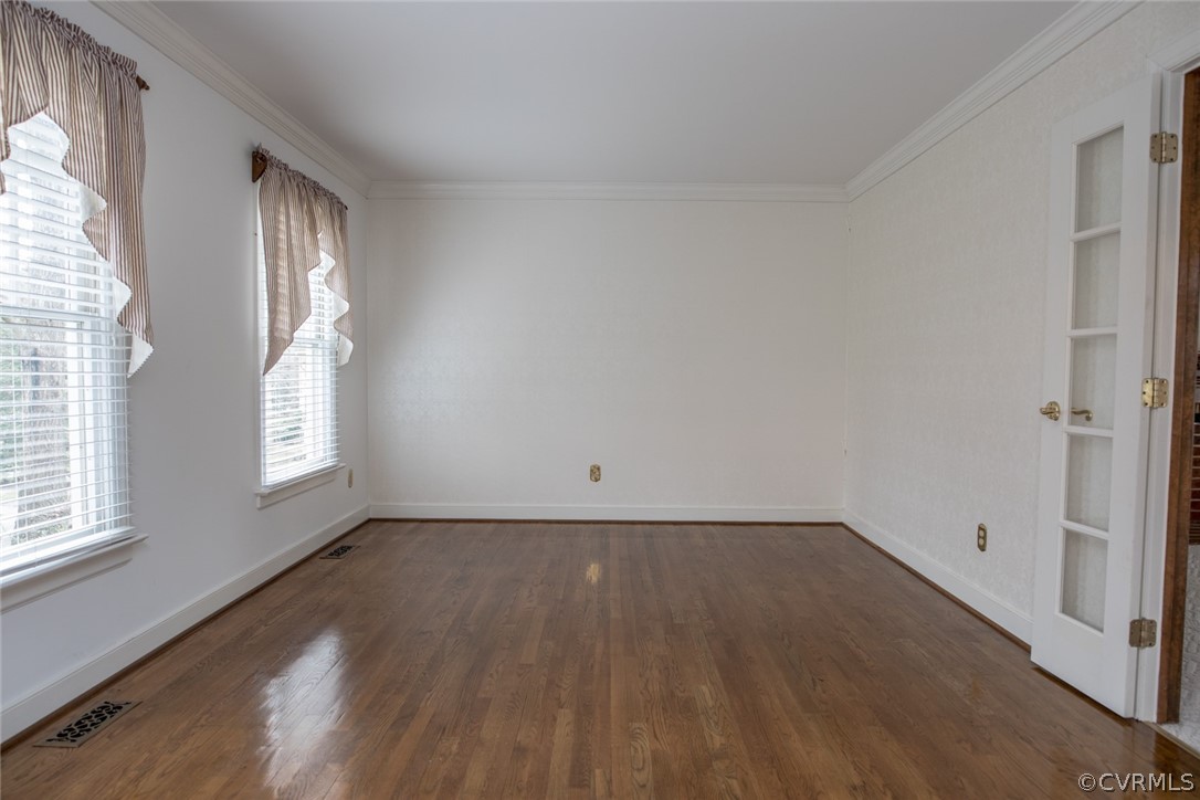 4624 Laurel Spring Court Chester, VA 23831 - Photo 2 of 31 an empty room with wooden floor and windows