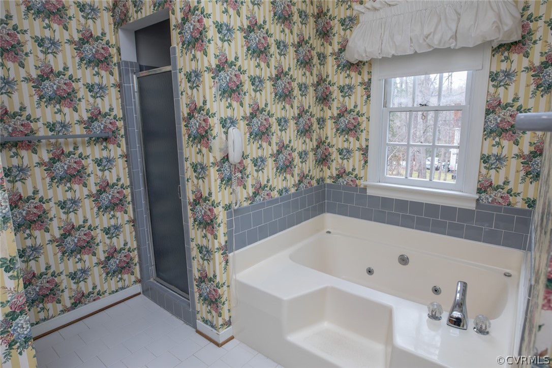 4624 Laurel Spring Court Chester, VA 23831 - Photo 21 of 31 a bathroom with a bathtub and a shower