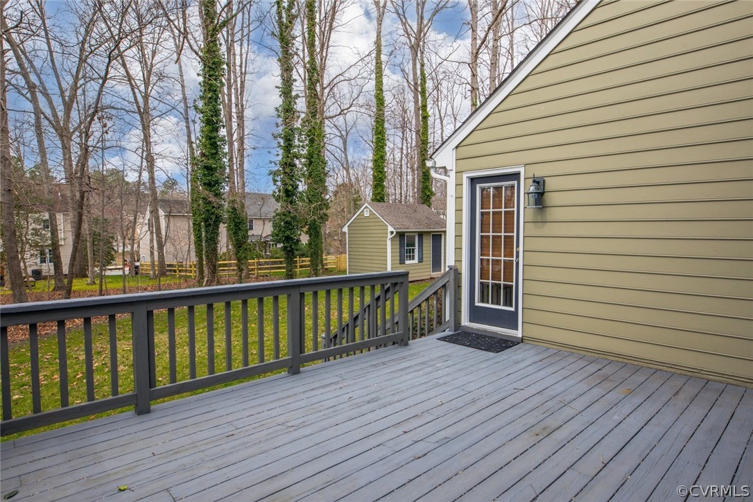 4624 Laurel Spring Court Chester, VA 23831 - Photo 27 of 31 a view of deck with wooden floor and fence and floor to ceiling window