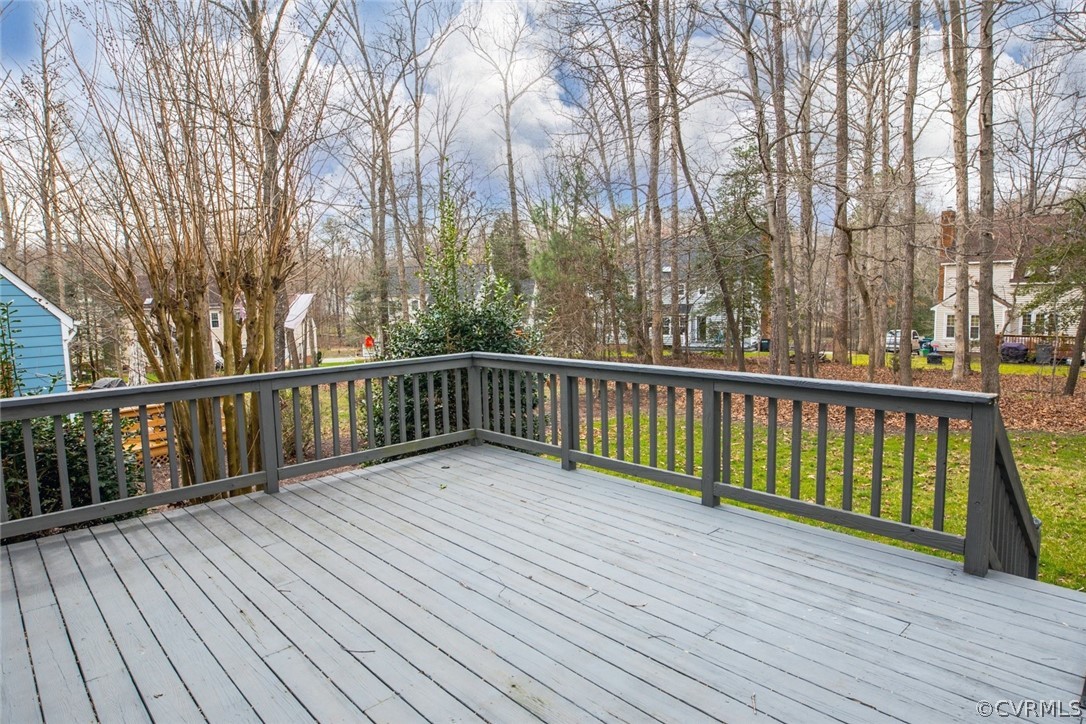 4624 Laurel Spring Court Chester, VA 23831 - Photo 28 of 31 a view of balcony with wooden floor and fence