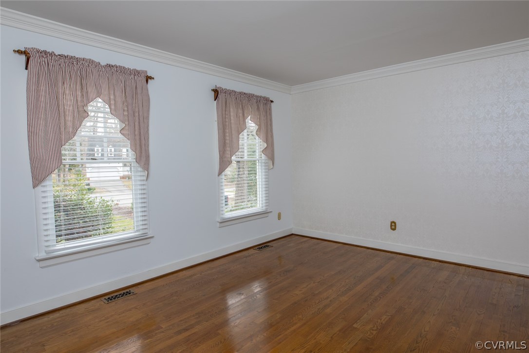 4624 Laurel Spring Court Chester, VA 23831 - Photo 3 of 31 a view of an empty room with wooden floor and a window