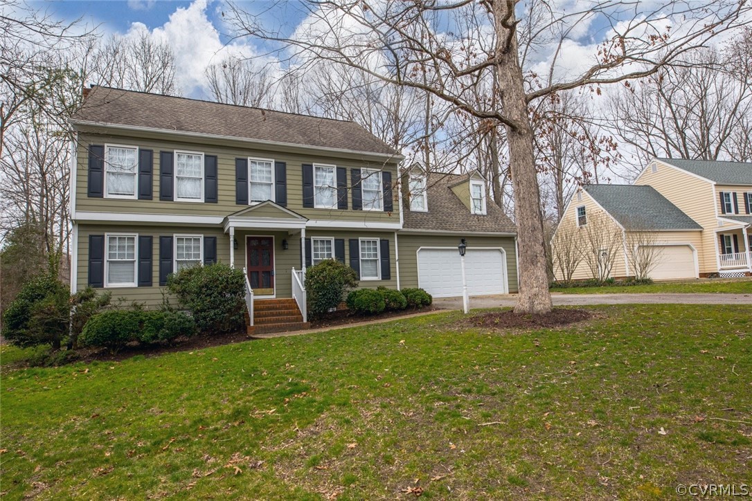 4624 Laurel Spring Court Chester, VA 23831 - Photo 31 of 31 a front view of house with yard and green space