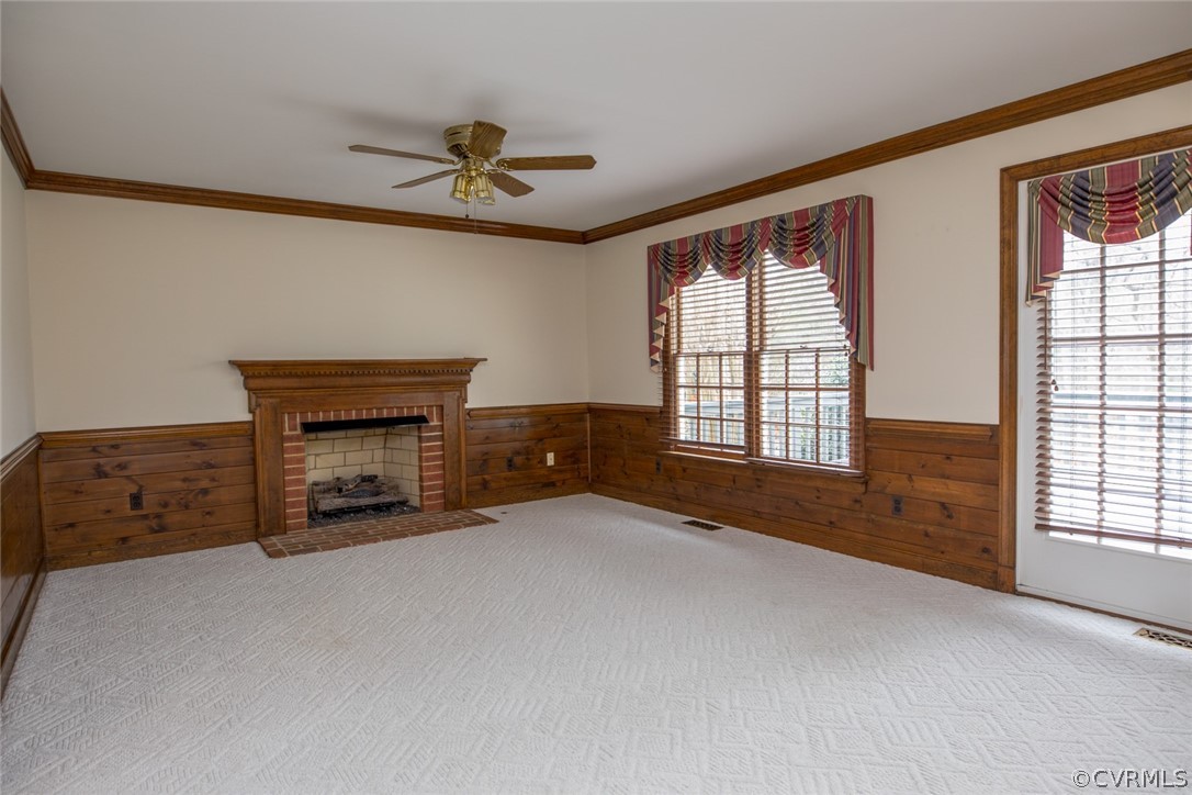 4624 Laurel Spring Court Chester, VA 23831 - Photo 5 of 31 a view of an empty room with a fireplace and a window