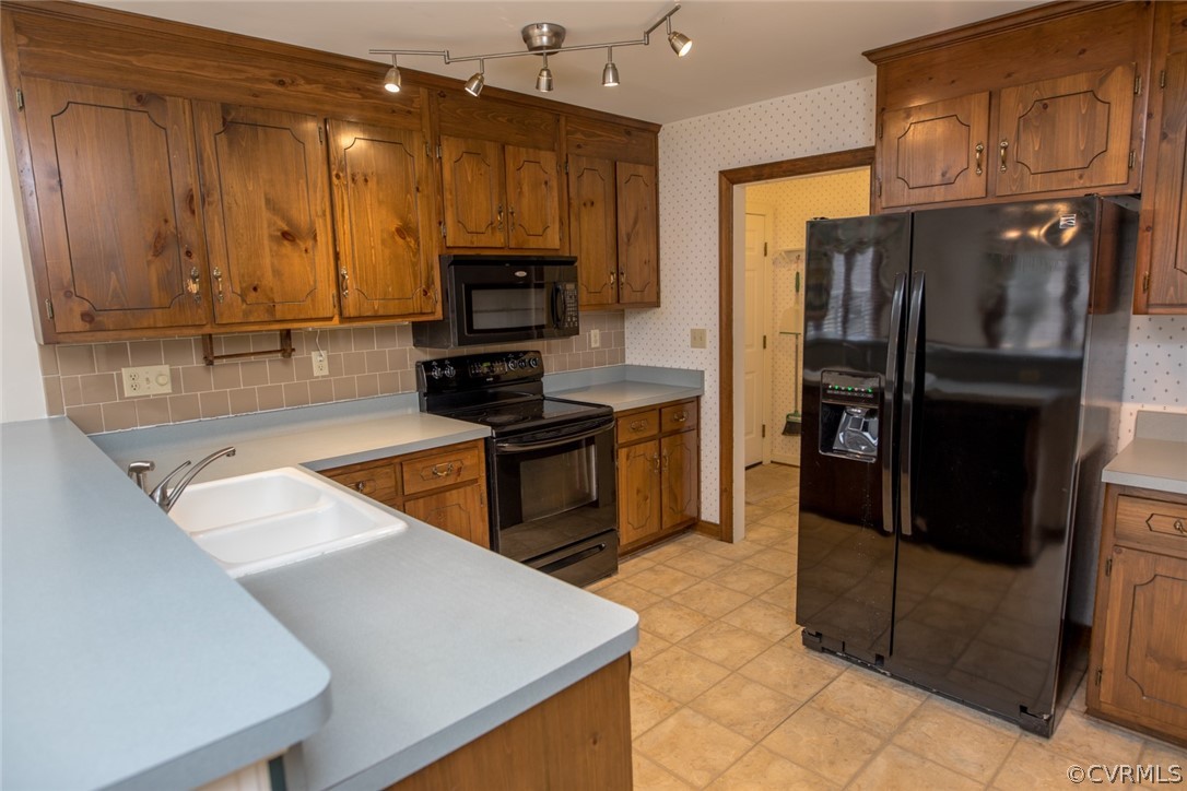 4624 Laurel Spring Court Chester, VA 23831 - Photo 8 of 31 a kitchen with stainless steel appliances granite countertop a refrigerator a stove and a sink