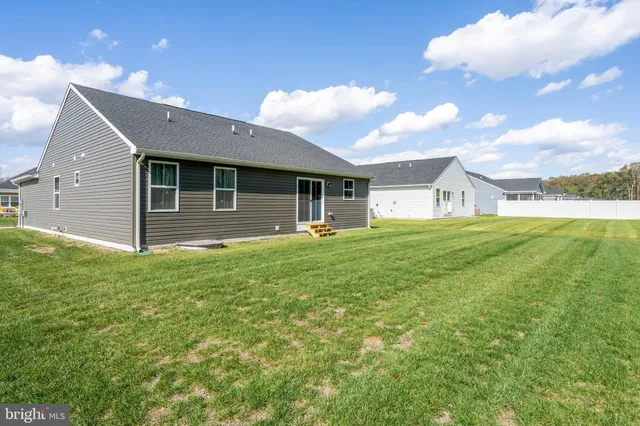 a front view of house with yard