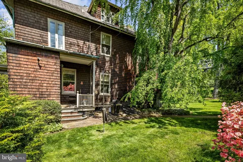 a backyard of a house with lots of green space
