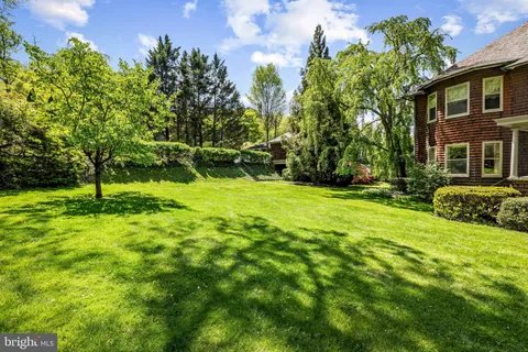 a view of a house with a big yard