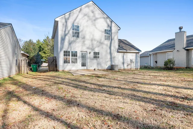 a front view of a house with a outdoor space