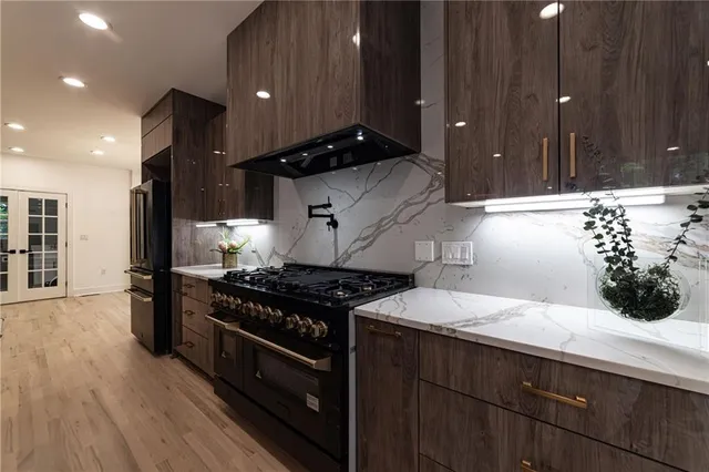 a view of house with backyard