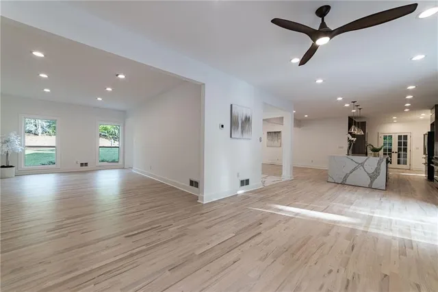 a bathroom with a toilet sink and shower